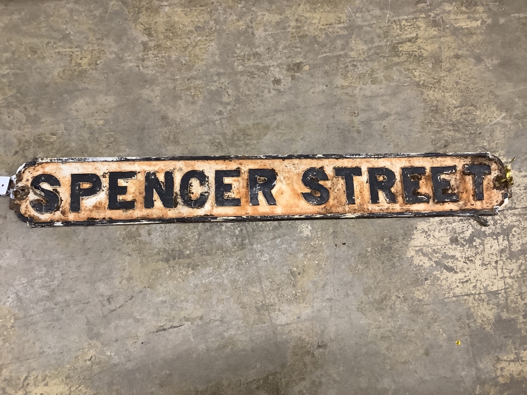 A vintage cast iron street sign for Spencer Street, 98 x 13cm